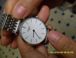 longines l46352？请问浪琴表型号为L46352编号为28137858多少钱是假的吗？